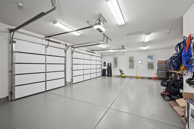garage featuring a garage door opener