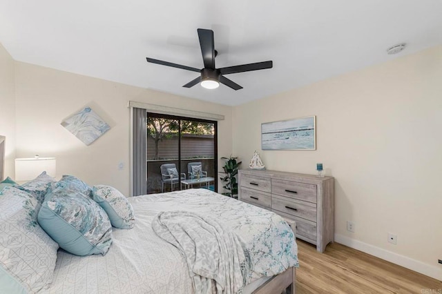 1063 Shadowridge Dr Unit 29, Vista, CA 92081 - bedroom with access to outside, baseboards, ceiling fan, and light wood finished floors