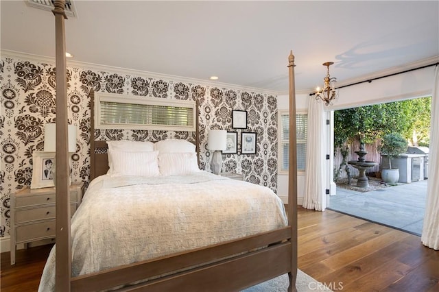 2400 Holly Ln, Newport Beach, CA 92663 - bedroom with wallpapered walls, access to exterior, crown molding, hardwood / wood-style floors, and a chandelier
