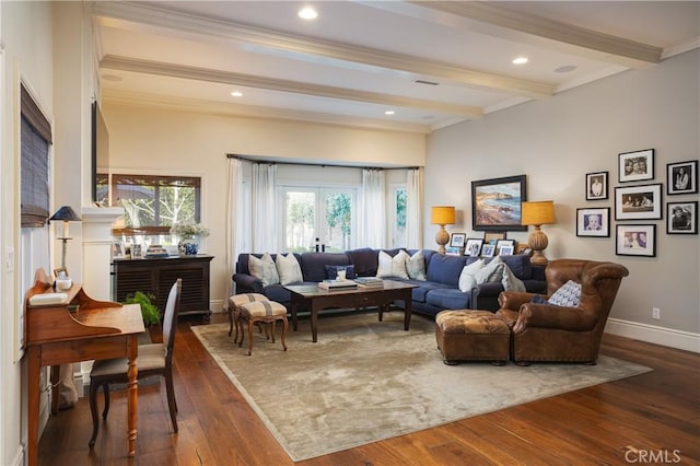 living area with dark wood-type flooring, baseboards, beamed ceiling, and ornamental molding