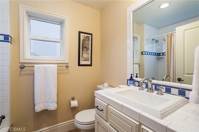 2400 Holly Ln, Newport Beach, CA 92663 - bathroom featuring toilet, vanity, baseboards, and a shower with shower curtain