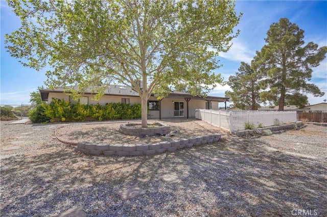 15084 Tacony Rd, Apple Valley, CA 92307 - back of property with a patio, stucco siding, and fence