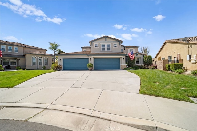 view of front of property with an attached garage, driveway, stucco siding, and a front yard