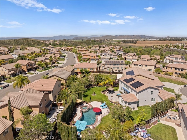 bird's eye view with a mountain view and a residential view