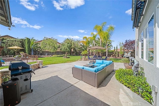 view of patio featuring an outdoor living space and fence