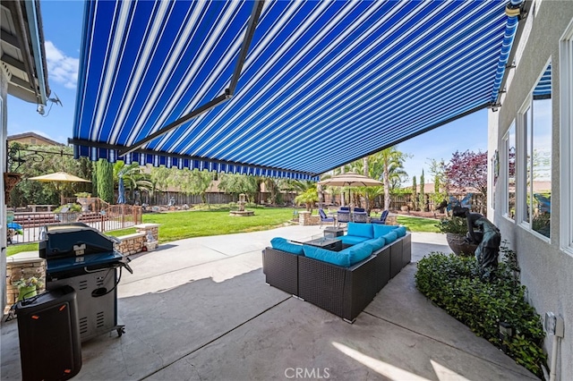 view of patio / terrace with a fenced backyard, outdoor dining space, and outdoor lounge area