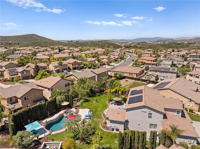 bird's eye view featuring a residential view and a mountain view