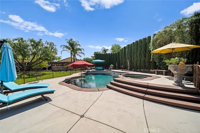 view of swimming pool featuring a fenced in pool, a patio area, a fenced backyard, and an in ground hot tub