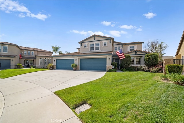 view of front of home featuring a front lawn, stucco siding, an attached garage, and concrete driveway