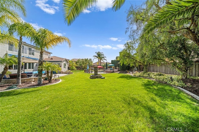 view of yard featuring fence
