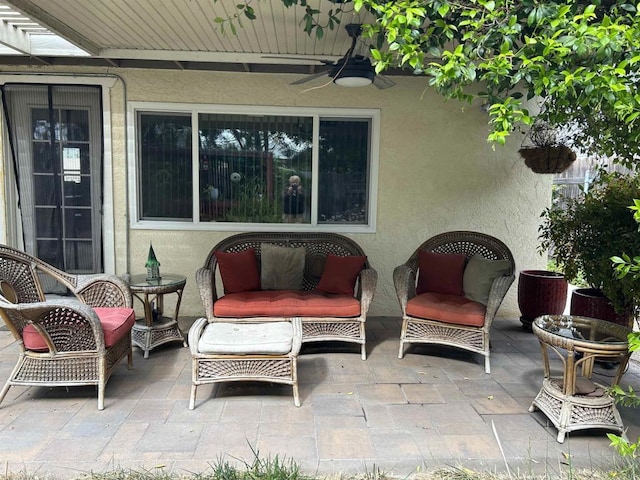 view of patio / terrace featuring a ceiling fan and an outdoor hangout area