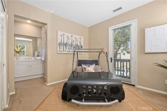115 Vermillion, Irvine, CA 92603 - bedroom featuring connected bathroom, visible vents, light carpet, access to exterior, and baseboards