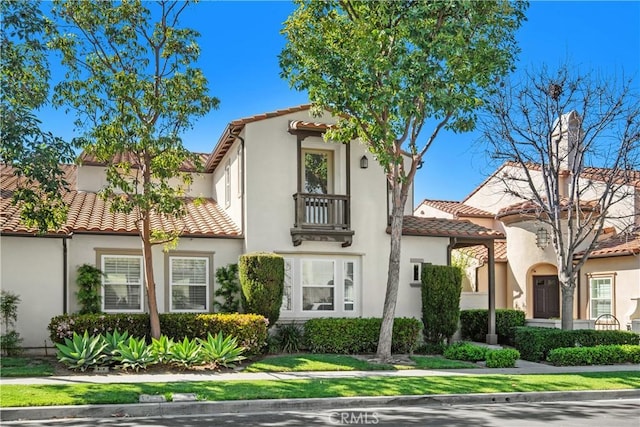 115 Vermillion, Irvine, CA 92603 - mediterranean / spanish house featuring stucco siding and a tiled roof
