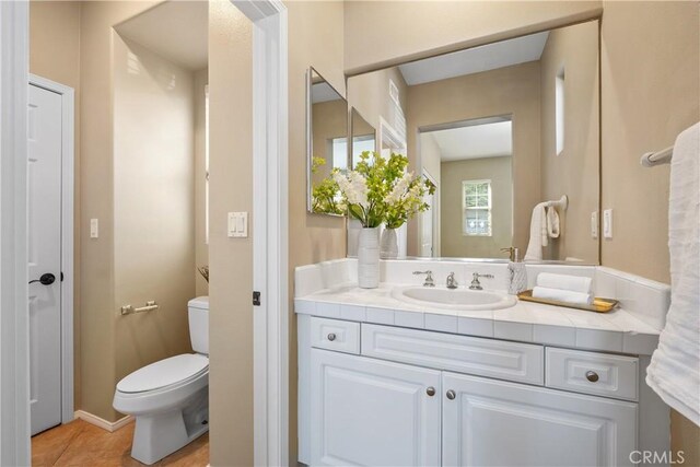 115 Vermillion, Irvine, CA 92603 - bathroom with tile patterned flooring, vanity, and toilet