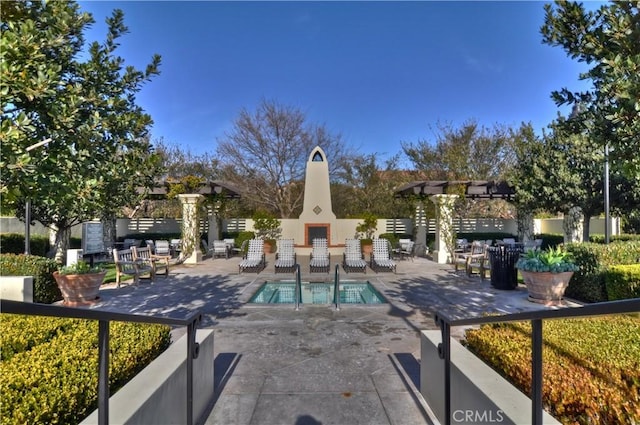 115 Vermillion, Irvine, CA 92603 - view of pool featuring exterior fireplace and a patio
