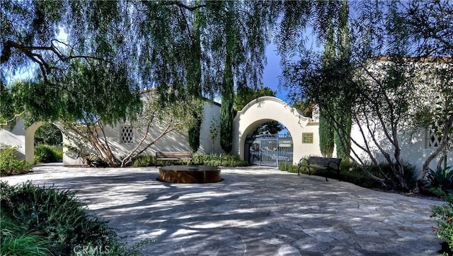 115 Vermillion, Irvine, CA 92603 - view of home's community with a gate