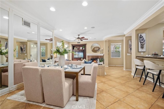 115 Vermillion, Irvine, CA 92603 - living room with ornamental molding, a ceiling fan, recessed lighting, light tile patterned flooring, and a brick fireplace