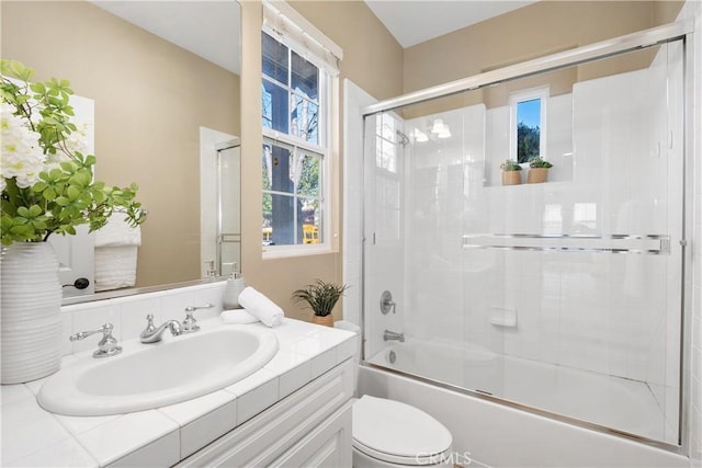 115 Vermillion, Irvine, CA 92603 - full bathroom featuring plenty of natural light, vanity, shower / bath combination with glass door, and toilet