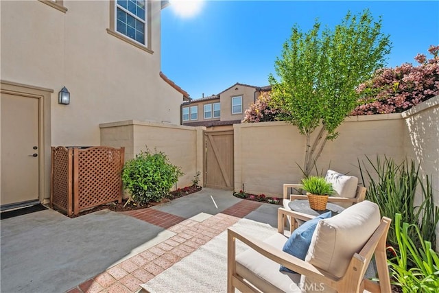 115 Vermillion, Irvine, CA 92603 - view of patio featuring a fenced backyard