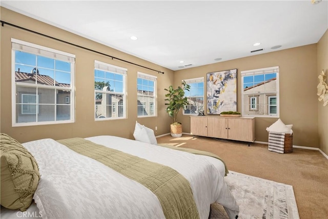 115 Vermillion, Irvine, CA 92603 - bedroom featuring light carpet, baseboards, visible vents, and recessed lighting