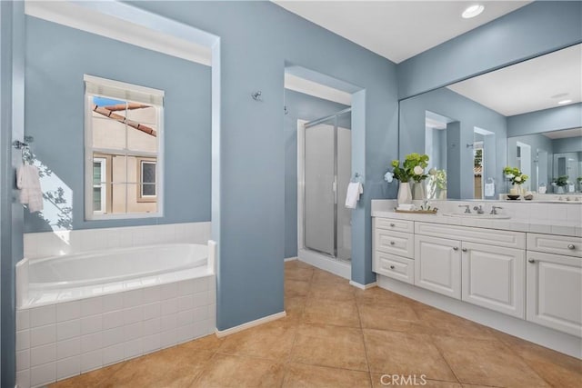 115 Vermillion, Irvine, CA 92603 - full bathroom featuring a wealth of natural light, tile patterned flooring, a stall shower, and vanity