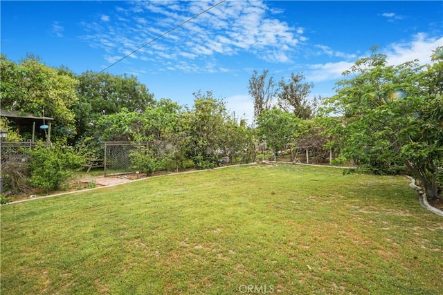 view of yard with fence
