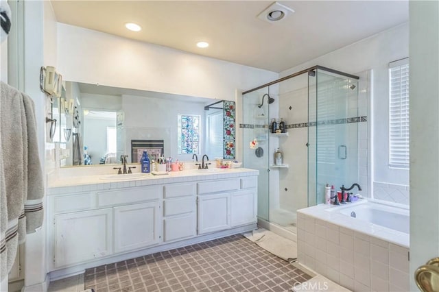 18641 Nathan Hill Dr Unit 8, Canyon Country, CA 91351 - bathroom with a sink, a bath, a shower stall, and double vanity