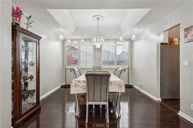 18641 Nathan Hill Dr Unit 8, Canyon Country, CA 91351 - dining space featuring a wealth of natural light, a notable chandelier, dark wood-style flooring, and baseboards