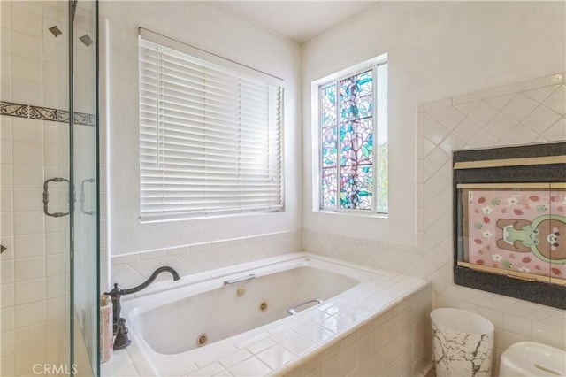 18641 Nathan Hill Dr Unit 8, Canyon Country, CA 91351 - bathroom with a shower stall, a healthy amount of sunlight, a whirlpool tub, and toilet