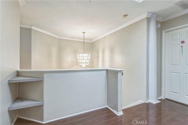 18641 Nathan Hill Dr Unit 8, Canyon Country, CA 91351 - interior space featuring crown molding, wood finished floors, a notable chandelier, and baseboards
