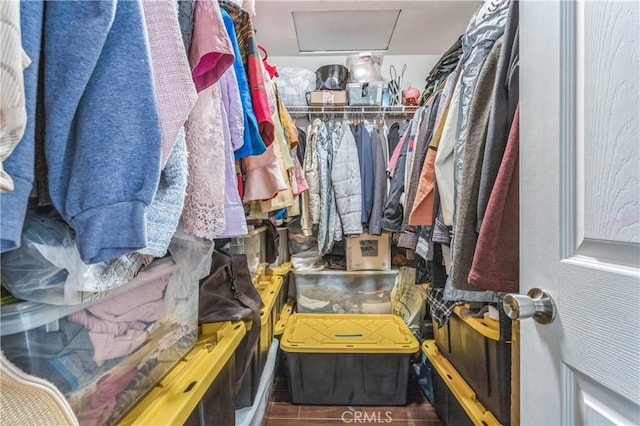 18641 Nathan Hill Dr Unit 8, Canyon Country, CA 91351 - walk in closet featuring attic access and wood finished floors
