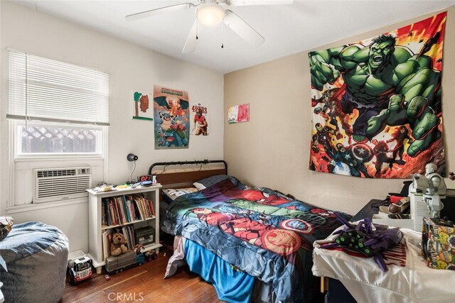 1109 Ivy St, Chico, CA 95928 - bedroom featuring cooling unit, wood finished floors, and a ceiling fan