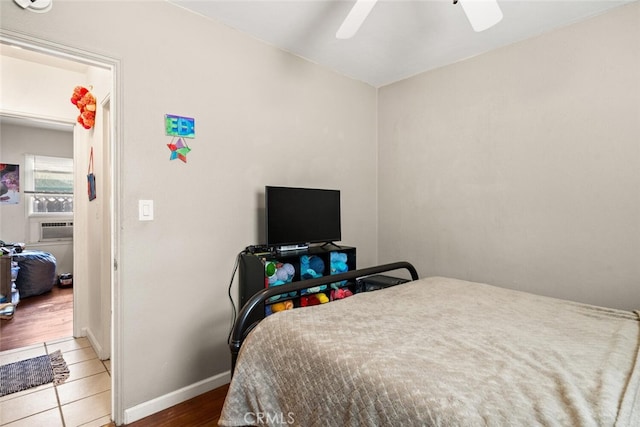 1109 Ivy St, Chico, CA 95928 - bedroom with baseboards, wood finished floors, and ceiling fan