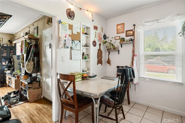 1109 Ivy St, Chico, CA 95928 - dining room with baseboards and light tile patterned flooring