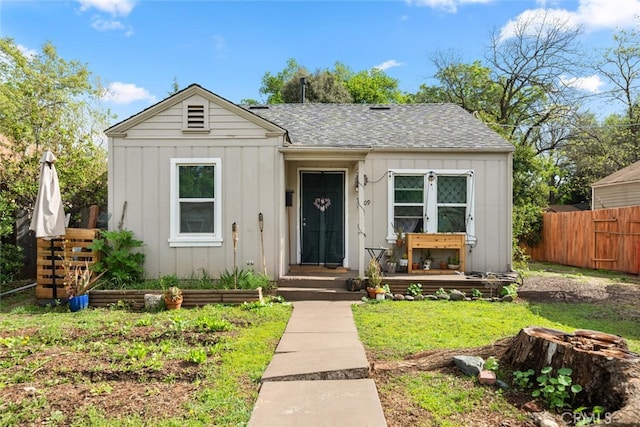 1109 Ivy St, Chico, CA 95928 - bungalow with board and batten siding, fence, and a shingled roof