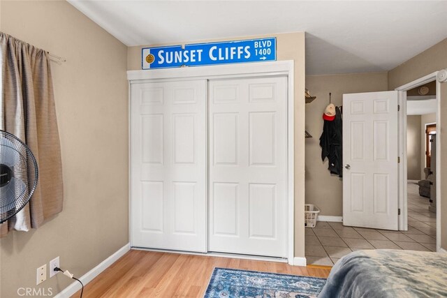 1109 Ivy St, Chico, CA 95928 - bedroom with wood finished floors, baseboards, and a closet