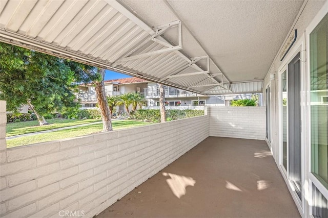 659 Avenida Sevilla Unit D, Laguna Woods, CA 92637 - view of patio with a balcony