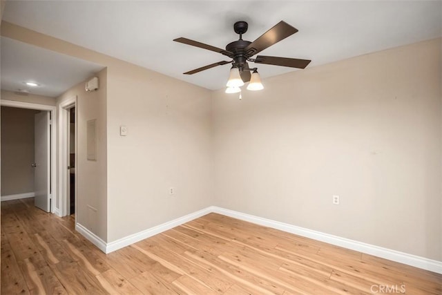 659 Avenida Sevilla Unit D, Laguna Woods, CA 92637 - empty room featuring baseboards, light wood-style flooring, and ceiling fan