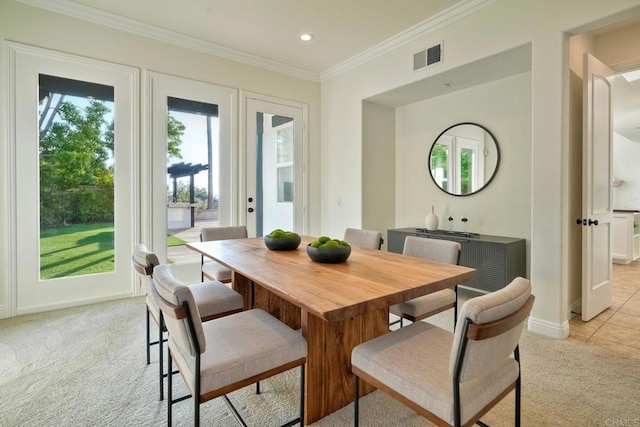 1664 Aryana Dr, Encinitas, CA 92024 - dining area featuring light colored carpet, crown molding, and recessed lighting