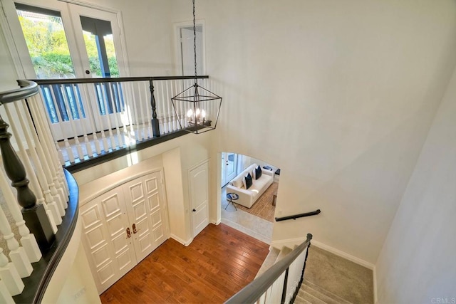 1664 Aryana Dr, Encinitas, CA 92024 - staircase with a chandelier and wood finished floors