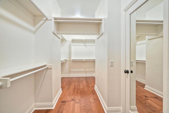 1664 Aryana Dr, Encinitas, CA 92024 - spacious closet with wood-type flooring