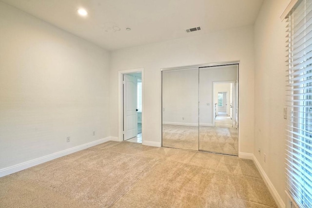 1664 Aryana Dr, Encinitas, CA 92024 - unfurnished bedroom with light carpet, a closet, and recessed lighting