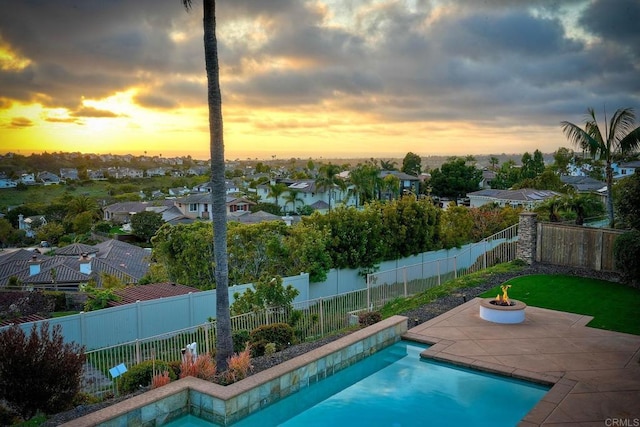 1664 Aryana Dr, Encinitas, CA 92024 - view of swimming pool featuring a patio area, a fenced backyard, a residential view, and a fire pit