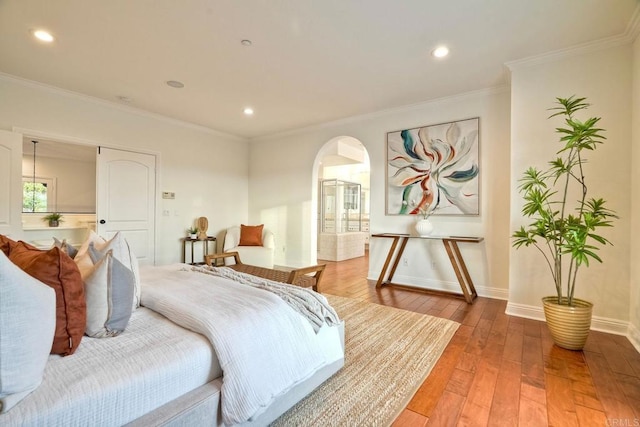 1664 Aryana Dr, Encinitas, CA 92024 - bedroom featuring arched walkways, light wood finished floors, recessed lighting, and crown molding