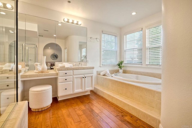 1664 Aryana Dr, Encinitas, CA 92024 - bathroom with vanity, wood-type flooring, a garden tub, an enclosed shower, and recessed lighting