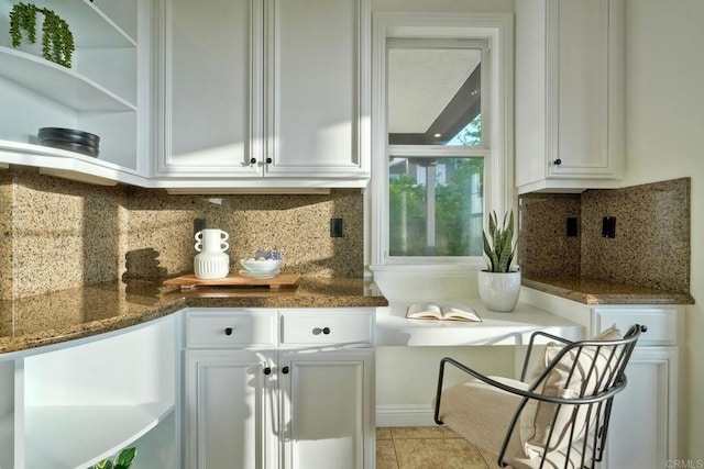 1664 Aryana Dr, Encinitas, CA 92024 - kitchen with open shelves, white cabinetry, and decorative backsplash