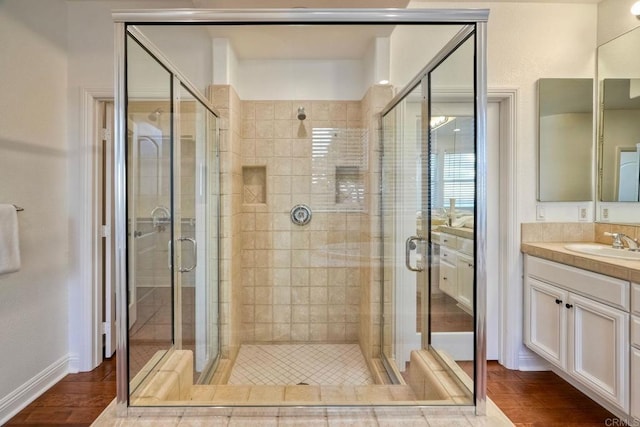 1664 Aryana Dr, Encinitas, CA 92024 - bathroom featuring vanity, a stall shower, and wood finished floors