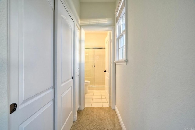 1664 Aryana Dr, Encinitas, CA 92024 - hallway featuring light tile patterned floors and light carpet