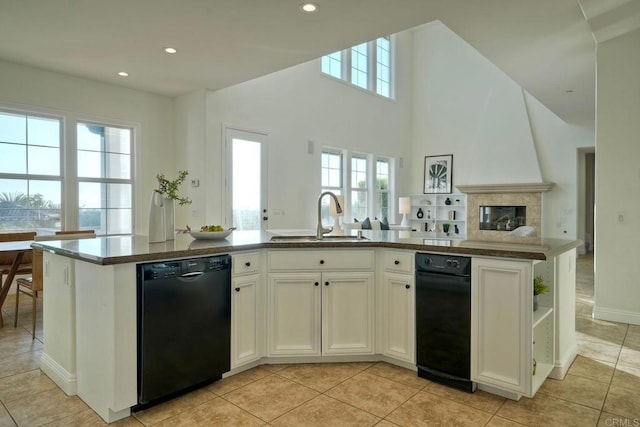 1664 Aryana Dr, Encinitas, CA 92024 - kitchen with black dishwasher, open floor plan, light tile patterned floors, recessed lighting, and white cabinets