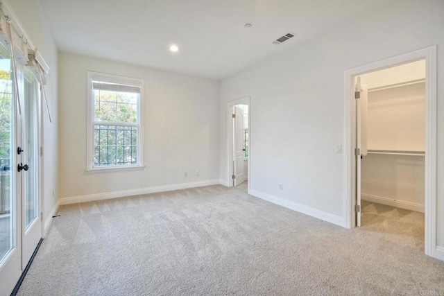 1664 Aryana Dr, Encinitas, CA 92024 - unfurnished bedroom with carpet, a spacious closet, recessed lighting, and ensuite bath